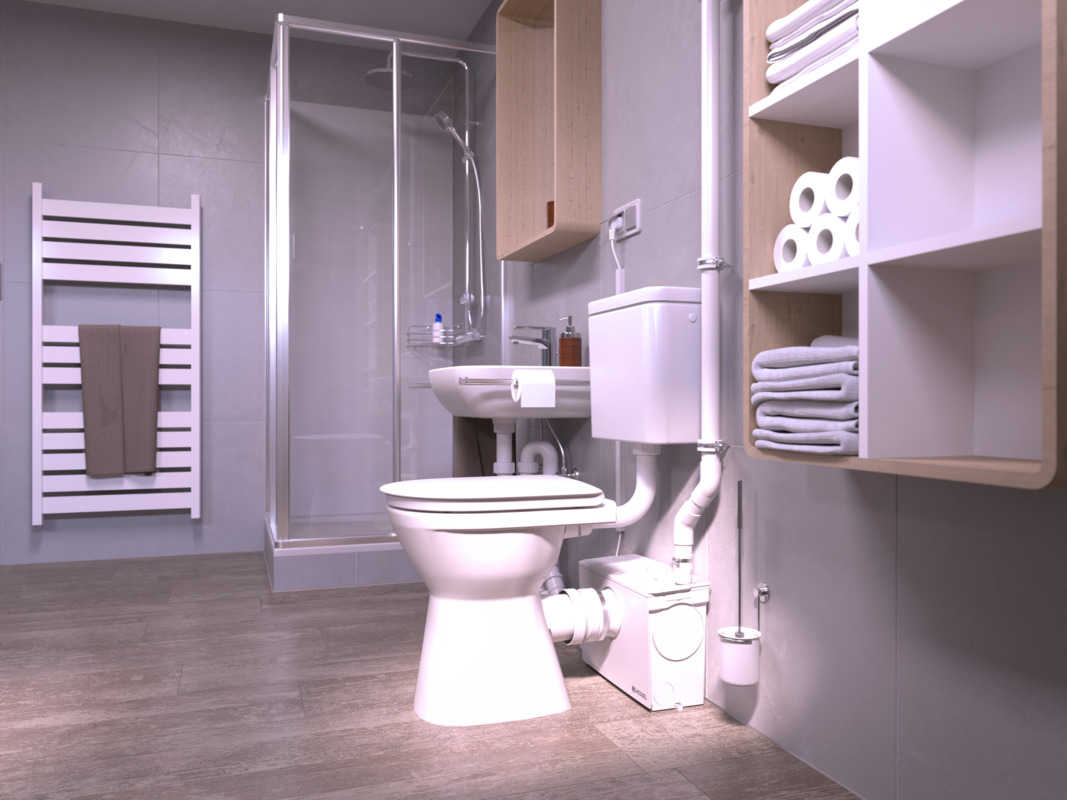 Installation diagram: Minilift M WC – second view A close-up of a toilet, behind which stands a small lifting station to which a shower is also connected.